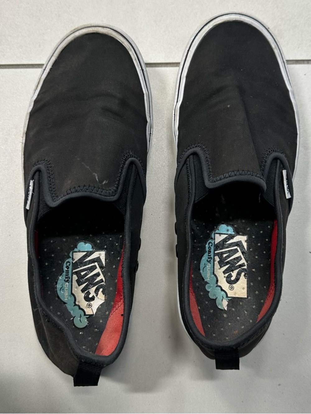 Vans Black Slip-On Sneakers with White Trim